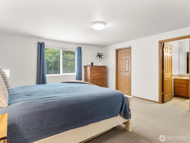 15428 Bornstein Ln SE, Yelm, WA 98597 - bedroom featuring light colored carpet and ensuite bathroom