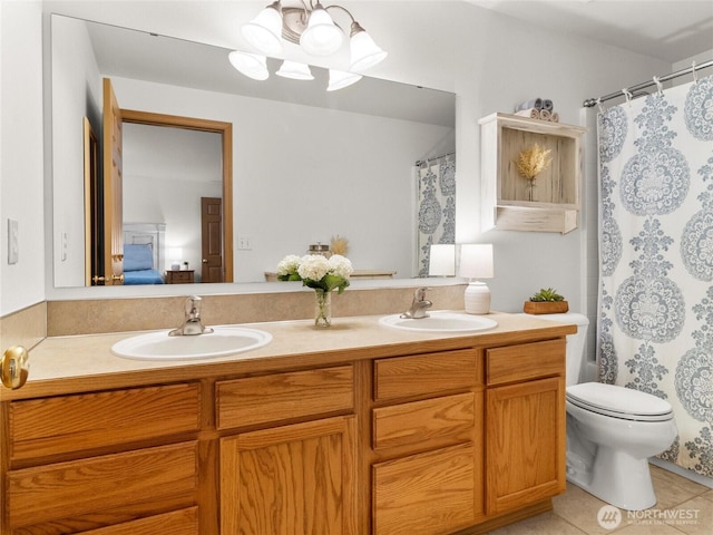 15428 Bornstein Ln SE, Yelm, WA 98597 - bathroom featuring double vanity and tile patterned flooring