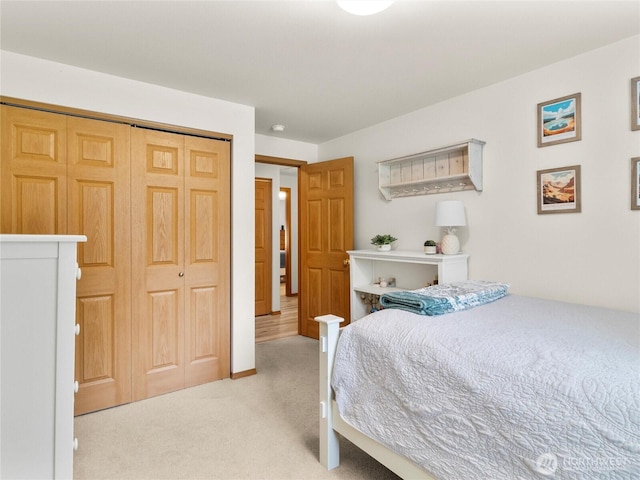 15428 Bornstein Ln SE, Yelm, WA 98597 - bedroom featuring light colored carpet and a closet
