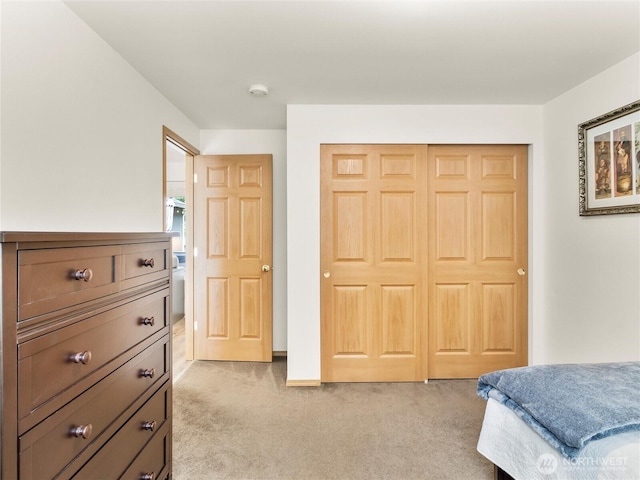15428 Bornstein Ln SE, Yelm, WA 98597 - bedroom featuring light carpet and a closet