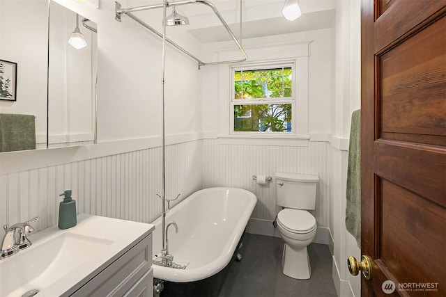 4010 Interlake Ave N, Seattle, WA 98103 - bathroom featuring a soaking tub, a wainscoted wall, and vanity