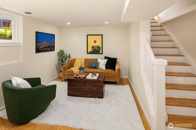 4010 Interlake Ave N, Seattle, WA 98103 - living room featuring stairway, wood finished floors, and recessed lighting