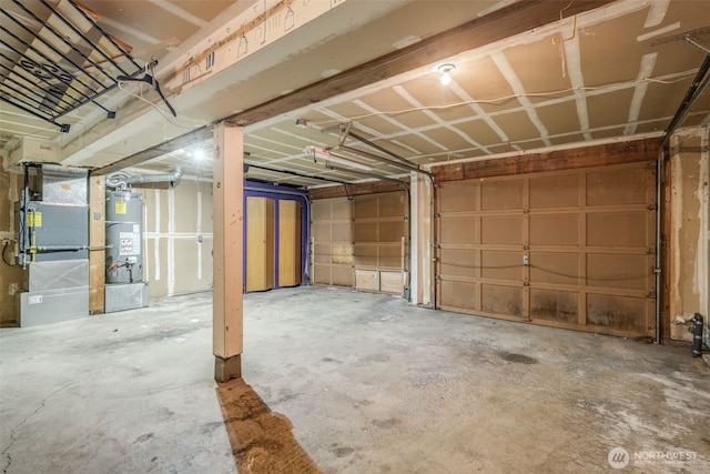 31107 11th Pl SW, Federal Way, WA 98023 - garage featuring secured water heater and heating unit