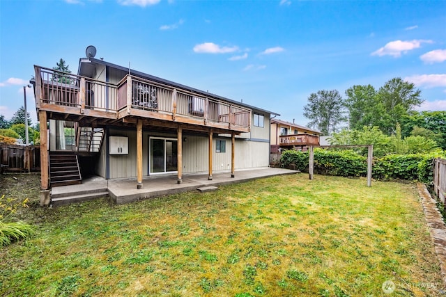 31107 11th Pl SW, Federal Way, WA 98023 - back of house with a patio area, a fenced backyard, stairs, and a wooden deck