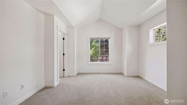 208 Sagebrook Ln, Cle Elum, WA 98922 - unfurnished bedroom with carpet, multiple windows, and vaulted ceiling
