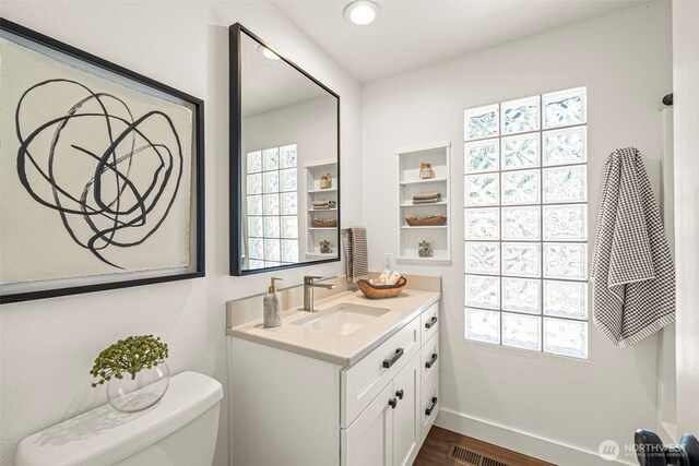 6401 146th Ave NE, Redmond, WA 98052 - bathroom featuring vanity and wood finished floors