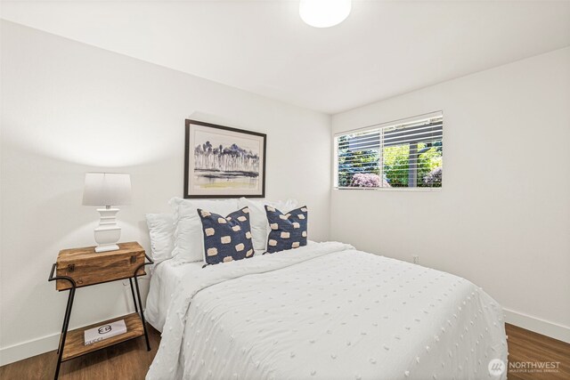 6401 146th Ave NE, Redmond, WA 98052 - bedroom with baseboards and wood finished floors