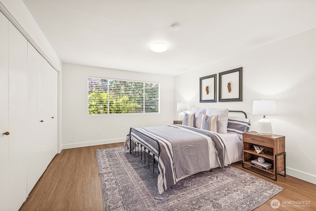 6401 146th Ave NE, Redmond, WA 98052 - bedroom with wood finished floors and a closet