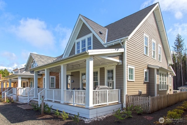100 Horseshoe Ln, Pacific Beach, WA 98571 - view of property exterior with a porch and a shingled roof