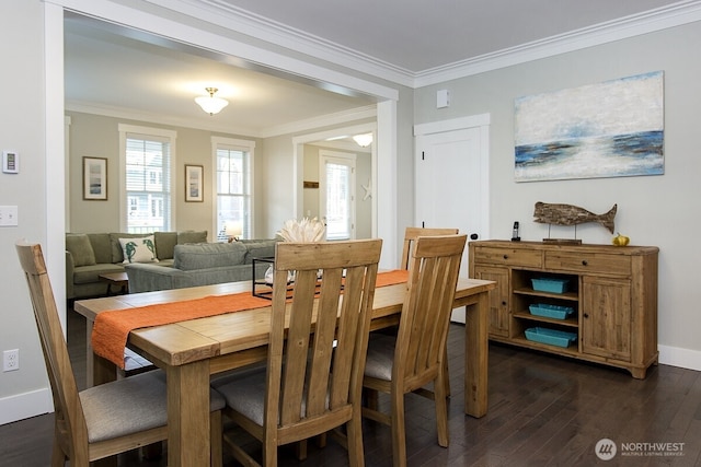 100 Horseshoe Ln, Pacific Beach, WA 98571 - dining area featuring dark wood-style flooring and ornamental molding