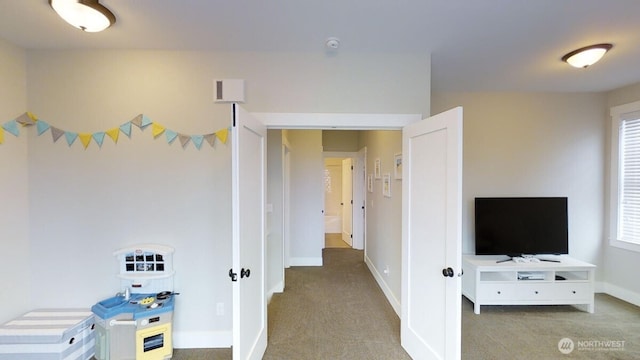 100 Horseshoe Ln, Pacific Beach, WA 98571 - recreation room featuring light colored carpet and baseboards