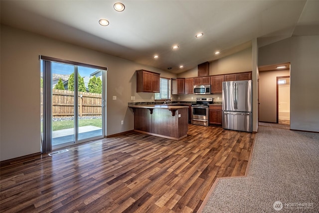 2124 Citation Loop, Wenatchee, WA 98801 - kitchen with stainless steel appliances, healthy amount of natural light, recessed lighting, a peninsula, and dark wood-style flooring