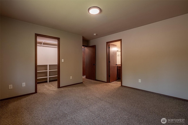 2124 Citation Loop, Wenatchee, WA 98801 - unfurnished bedroom featuring carpet, a spacious closet, and ensuite bath