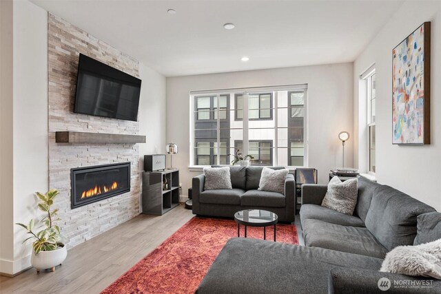 26637 NE Boyd Way Unit 102, Duvall, WA 98019 - living area with wood finished floors, a fireplace, and recessed lighting