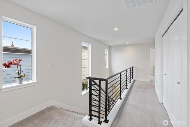 26637 NE Boyd Way Unit 102, Duvall, WA 98019 - hall featuring an upstairs landing, light colored carpet, and recessed lighting