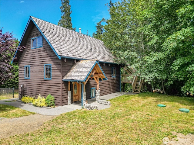 71 Waggler Way, Sequim, WA 98382 - view of front of home featuring a front lawn, stairs, and a wooden deck
