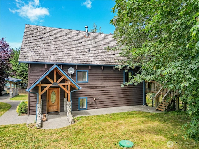 71 Waggler Way, Sequim, WA 98382 - back of house with a yard and stairs
