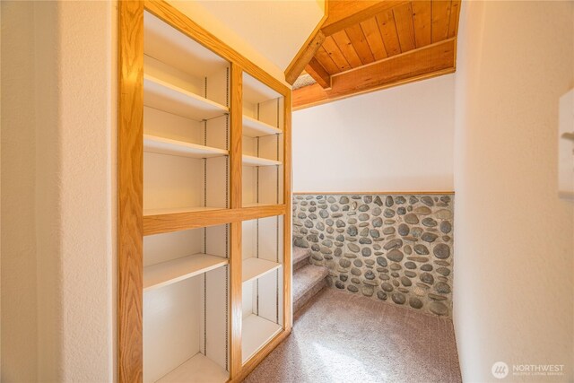 71 Waggler Way, Sequim, WA 98382 - bathroom featuring a wainscoted wall and a wood ceiling with exposed beams
