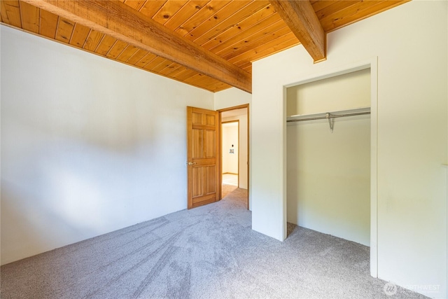 71 Waggler Way, Sequim, WA 98382 - unfurnished bedroom featuring carpet floors, a wood ceiling with exposed beams, and a closet