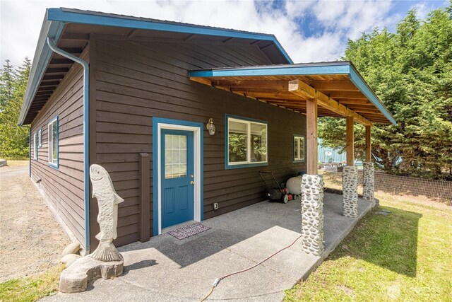 71 Waggler Way, Sequim, WA 98382 - doorway to property featuring a patio