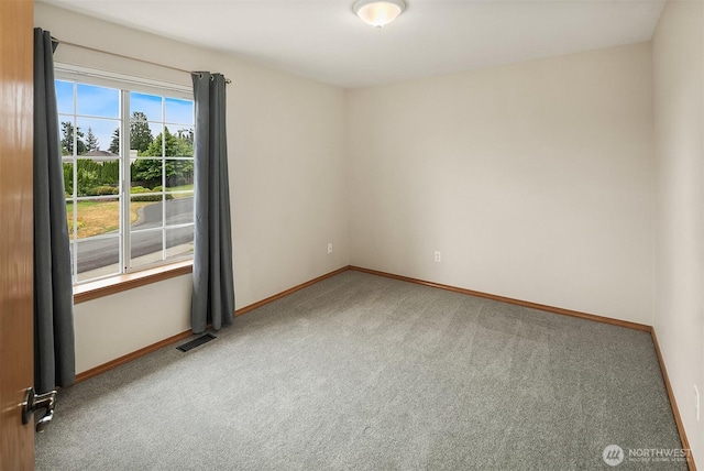 12820 SE 243rd St, Kent, WA 98030 - carpeted spare room with baseboards
