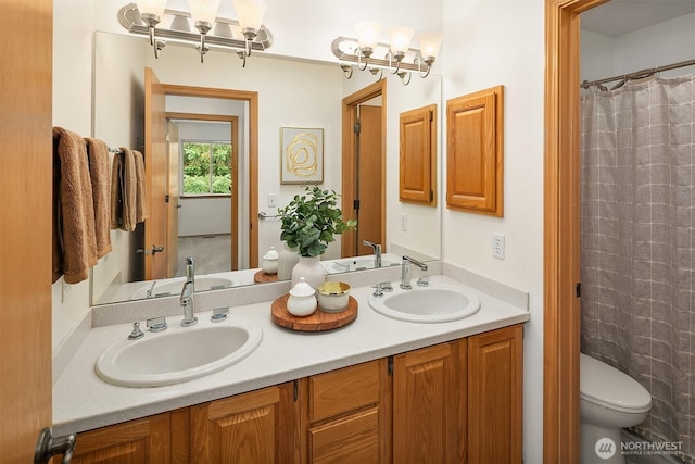 12820 SE 243rd St, Kent, WA 98030 - full bathroom featuring double vanity and toilet