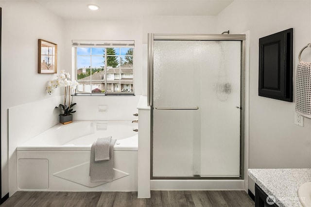 12820 SE 243rd St, Kent, WA 98030 - full bath with a shower stall, a bath, vanity, and wood finished floors