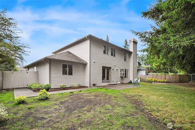 12820 SE 243rd St, Kent, WA 98030 - back of house with a chimney and a patio area