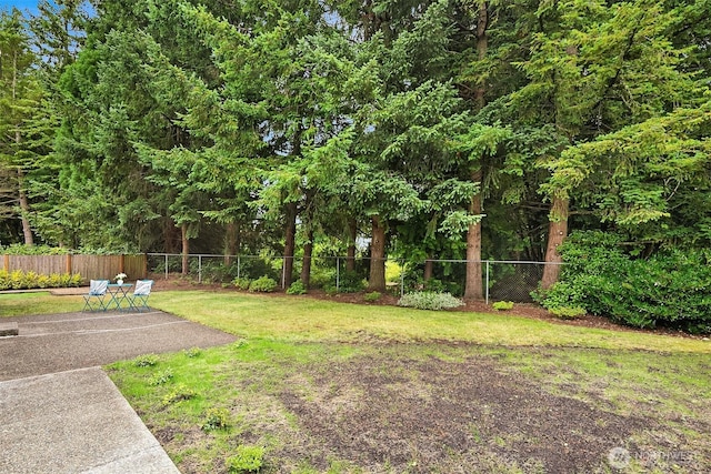 12820 SE 243rd St, Kent, WA 98030 - fenced backyard featuring a patio