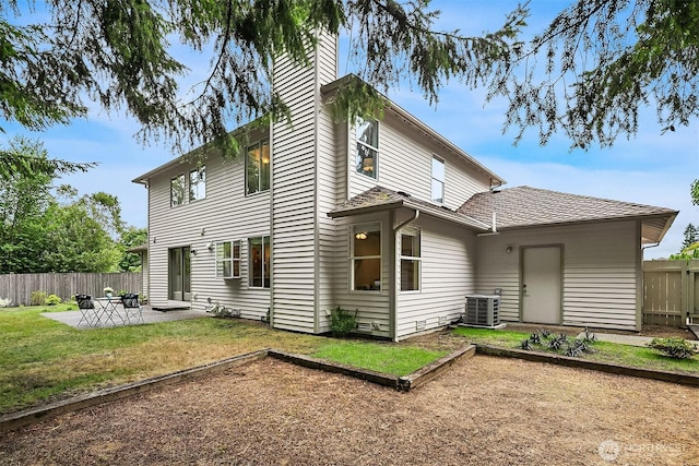 12820 SE 243rd St, Kent, WA 98030 - back of property featuring a patio and a vegetable garden
