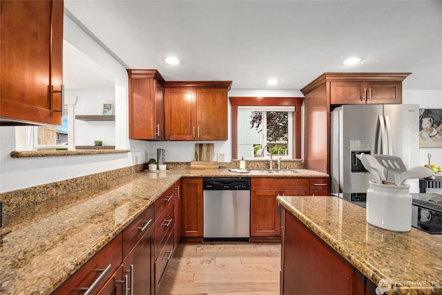 1339 N 167th St, Shoreline, WA 98133 - kitchen featuring stainless steel appliances, light wood-style floors, light stone counters, and recessed lighting