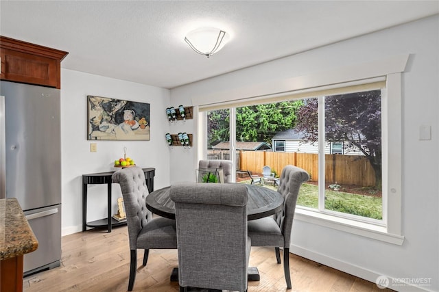 1339 N 167th St, Shoreline, WA 98133 - dining space featuring light wood-style flooring