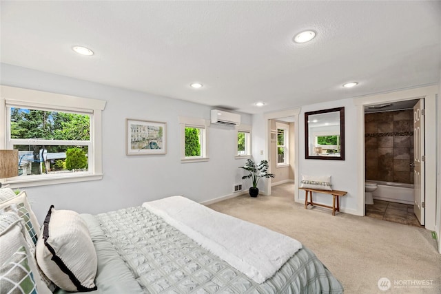 1339 N 167th St, Shoreline, WA 98133 - bedroom with a wall mounted air conditioner, light carpet, recessed lighting, multiple windows, and ensuite bathroom