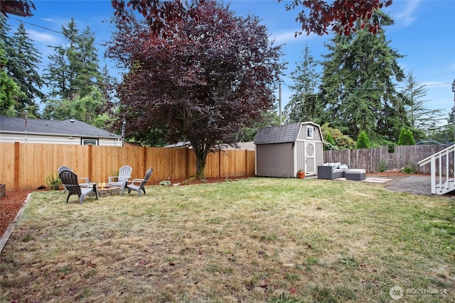 1339 N 167th St, Shoreline, WA 98133 - fenced backyard with a storage shed and an outdoor living space with a fire pit