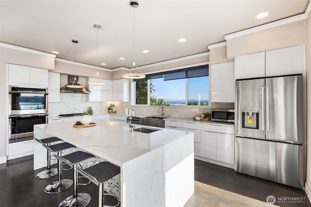 1422 Browns Point Blvd, Tacoma, WA 98422 - kitchen with stainless steel appliances, modern cabinets, wall chimney range hood, white cabinets, and dark wood finished floors