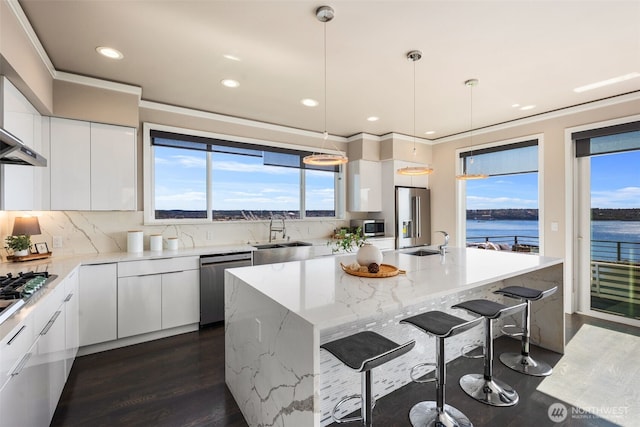 1422 Browns Point Blvd, Tacoma, WA 98422 - kitchen with stainless steel appliances, modern cabinets, white cabinets, recessed lighting, and crown molding