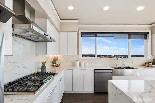 1422 Browns Point Blvd, Tacoma, WA 98422 - kitchen featuring stainless steel appliances, wall chimney exhaust hood, white cabinetry, recessed lighting, and light stone countertops