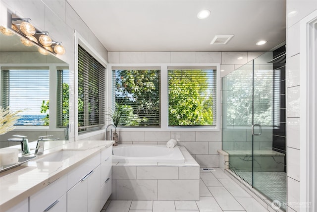 1422 Browns Point Blvd, Tacoma, WA 98422 - bathroom with vanity, a garden tub, a stall shower, and recessed lighting