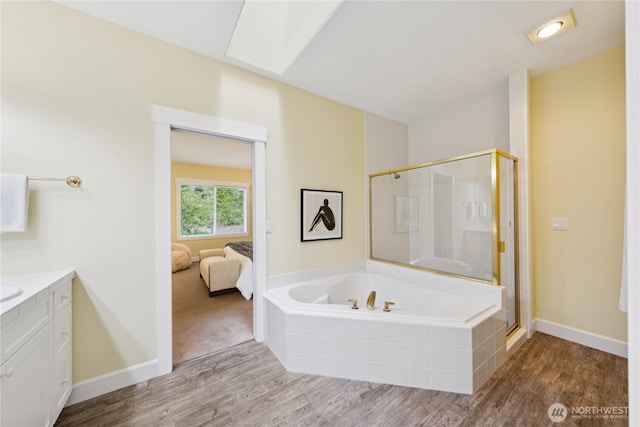 2218 Cascade Ct, Anacortes, WA 98221 - bathroom featuring a bath, wood finished floors, and a shower stall