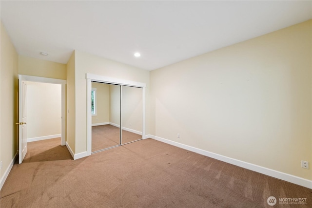 2218 Cascade Ct, Anacortes, WA 98221 - unfurnished bedroom with carpet floors, a closet, and recessed lighting