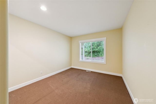 2218 Cascade Ct, Anacortes, WA 98221 - empty room with dark carpet and recessed lighting