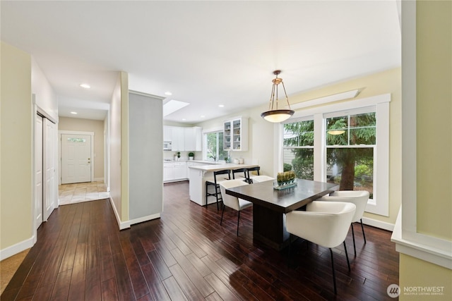 2218 Cascade Ct, Anacortes, WA 98221 - dining space featuring dark wood finished floors and recessed lighting