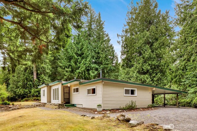 4210 Lakeway Dr, Bellingham, WA 98229 - view of front of home with gravel driveway and a front yard