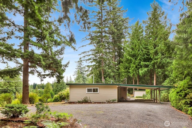 4210 Lakeway Dr, Bellingham, WA 98229 - view of front of home with gravel driveway and a carport