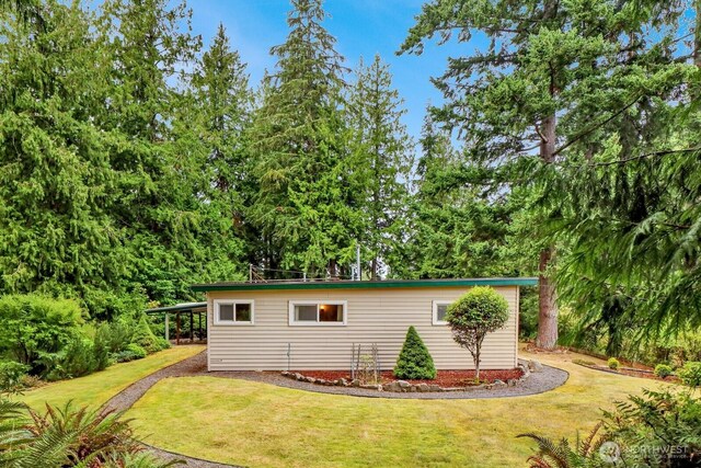 4210 Lakeway Dr, Bellingham, WA 98229 - view of side of home featuring a yard and an attached carport