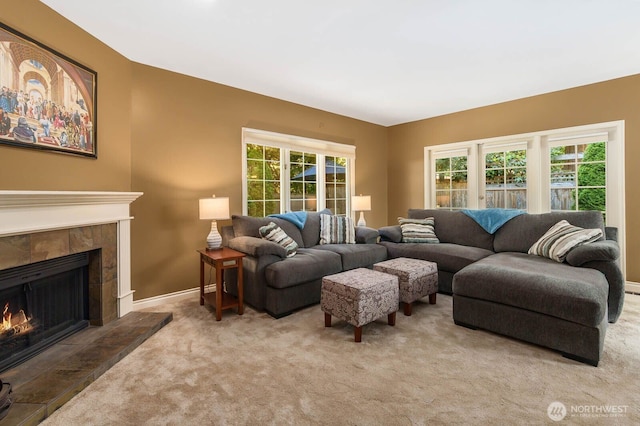 2444 220th Pl NE, Sammamish, WA 98074 - living room featuring a fireplace, light colored carpet, and plenty of natural light