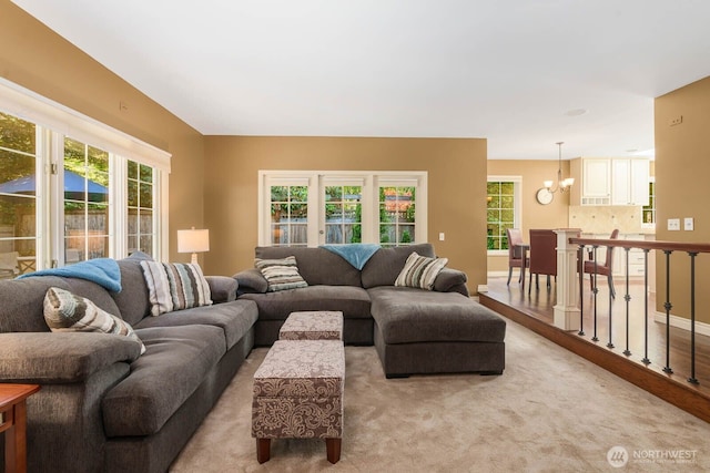 2444 220th Pl NE, Sammamish, WA 98074 - living area featuring a chandelier and light carpet