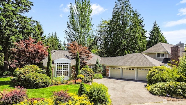 2444 220th Pl NE, Sammamish, WA 98074 - view of front of property with an attached garage, asphalt driveway, stone siding, and a front yard