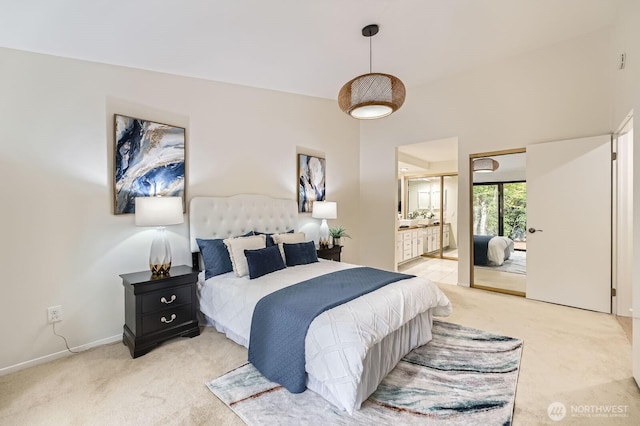 16142 SE 33rd Ln, Unit Bellevue, WA 98008 - bedroom featuring light colored carpet and ensuite bathroom