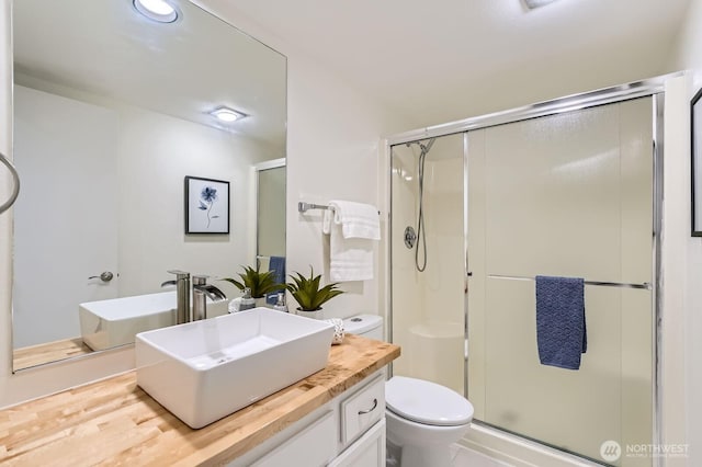 16142 SE 33rd Ln, Unit Bellevue, WA 98008 - bathroom featuring vanity and a stall shower
